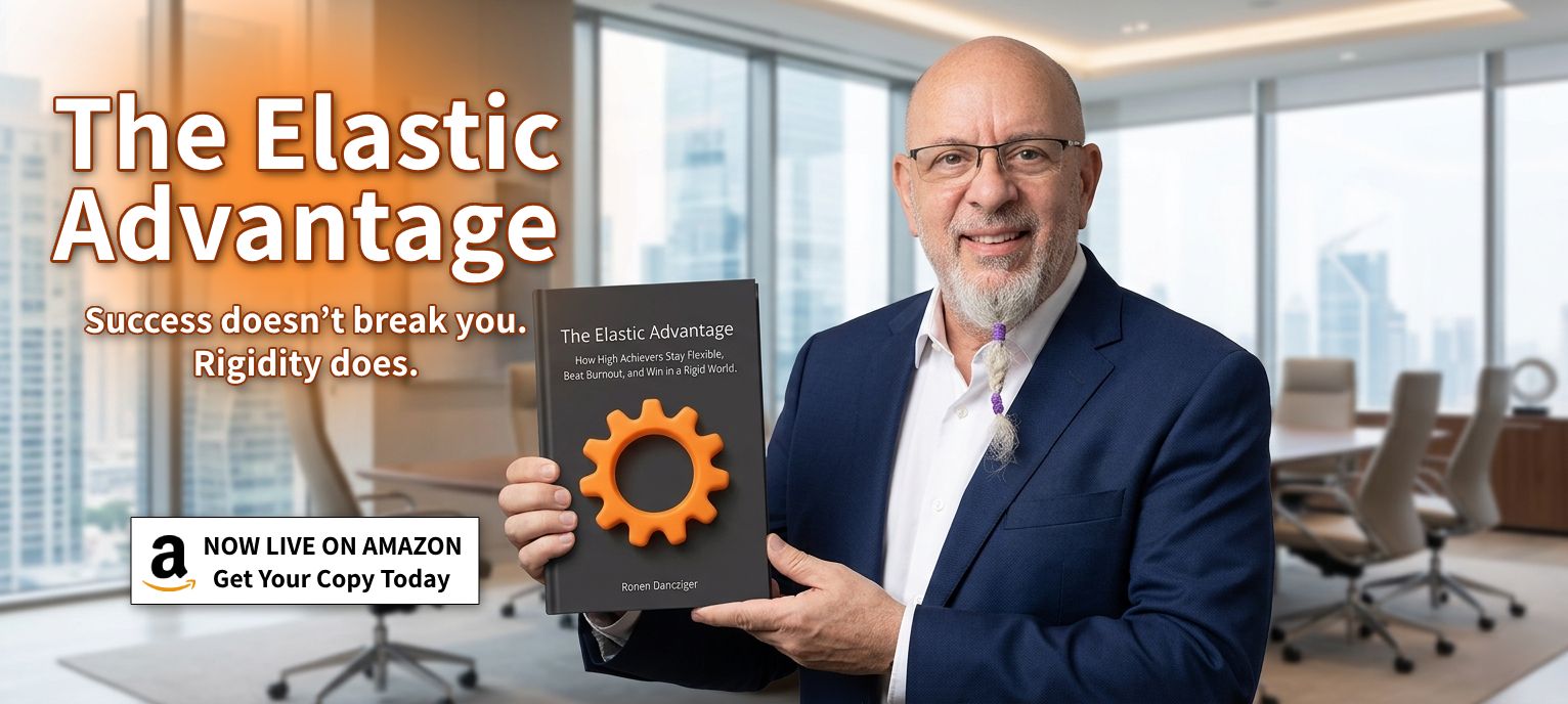 Ronen Dancziger holding his book The Elastic Advantage for leaders